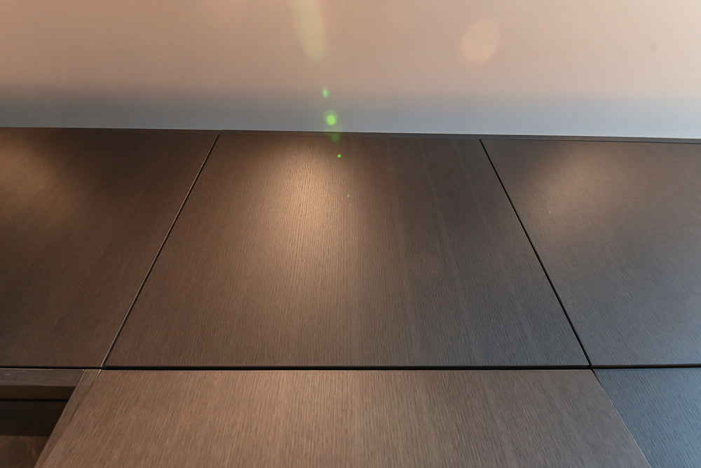 Custom Modern Wood Veneer Kitchen with White Marble Countertops and Wolf & Miele Appliances