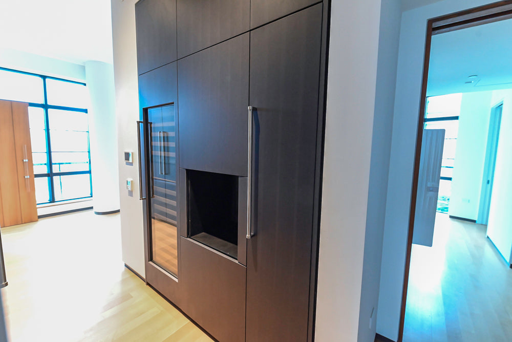 Custom Modern Wood Veneer Kitchen with White Marble Countertops and Wolf & Miele Appliances