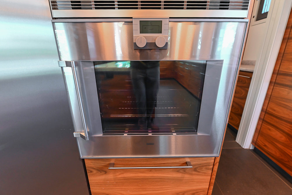 Custom Modern Tigerwood Kitchen with Marble Countertops and Gaggenau Appliances