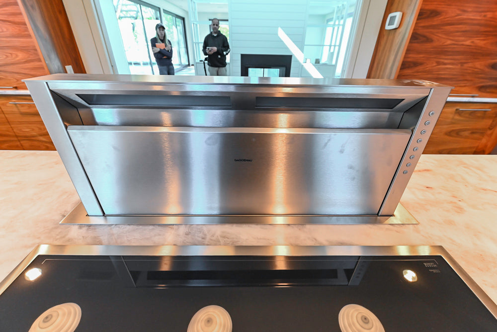 Custom Modern Tigerwood Kitchen with Marble Countertops and Gaggenau Appliances