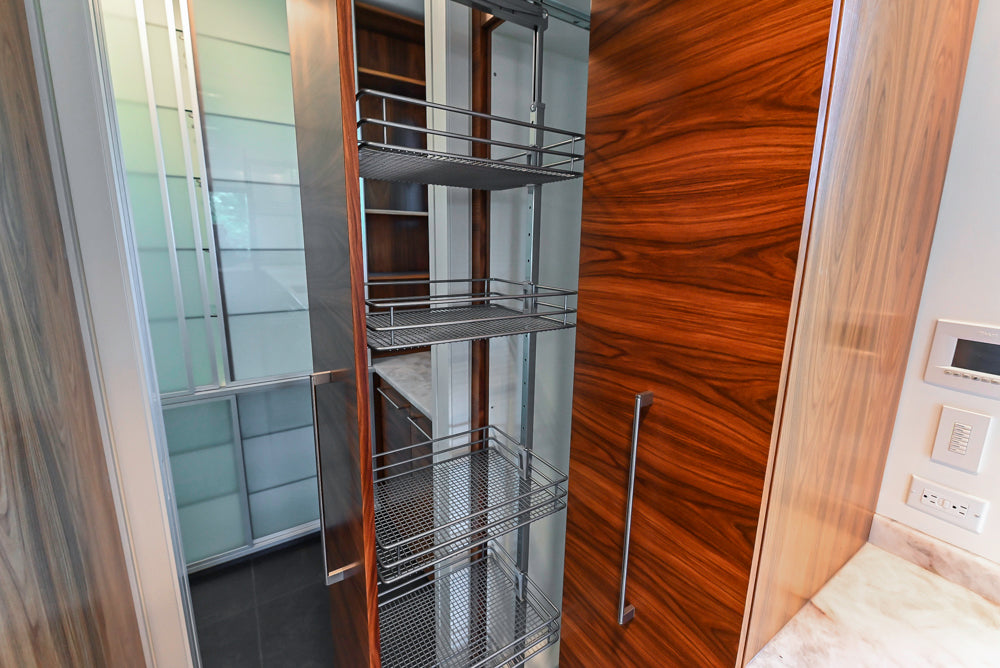 Custom Modern Tigerwood Kitchen with Marble Countertops and Gaggenau Appliances