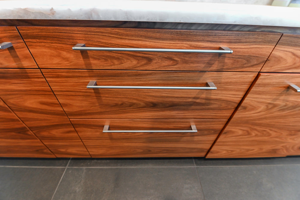 Custom Modern Tigerwood Kitchen with Marble Countertops and Gaggenau Appliances