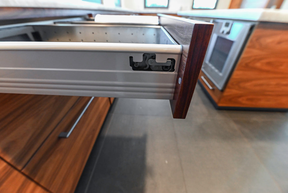 Custom Modern Tigerwood Kitchen with Marble Countertops and Gaggenau Appliances