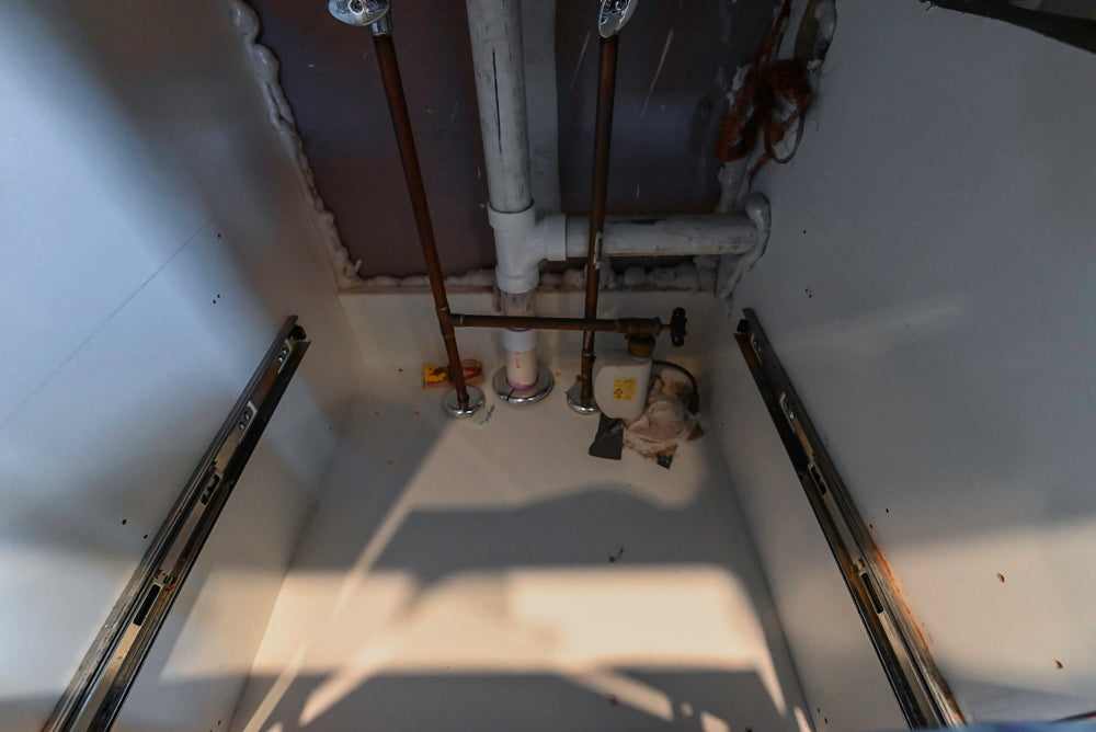 Custom Modern Tigerwood Kitchen with Marble Countertops and Gaggenau Appliances