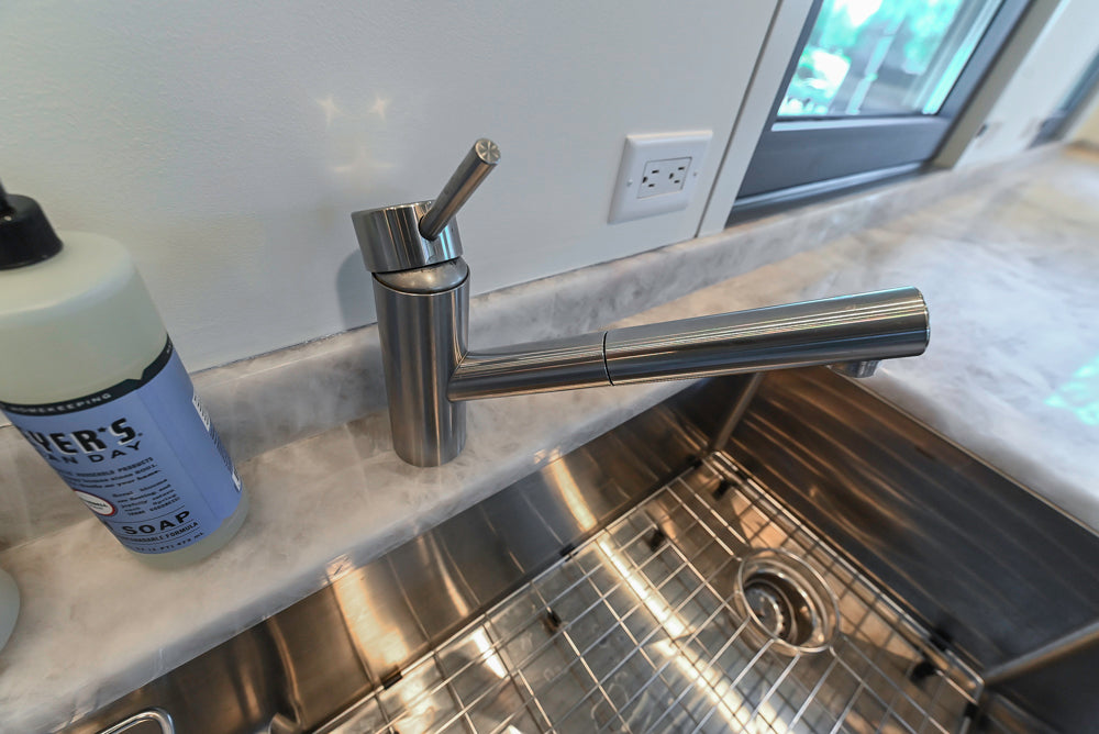 Custom Modern Tigerwood Kitchen with Marble Countertops and Gaggenau Appliances