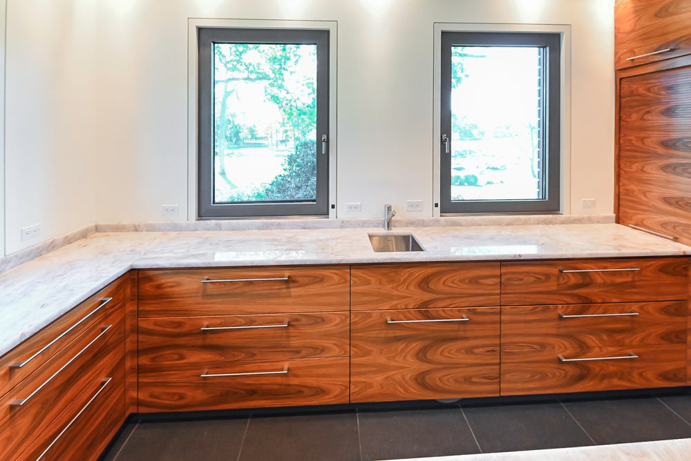 Custom Modern Kitchen with Marble Countertops and Gaggenau Appliances