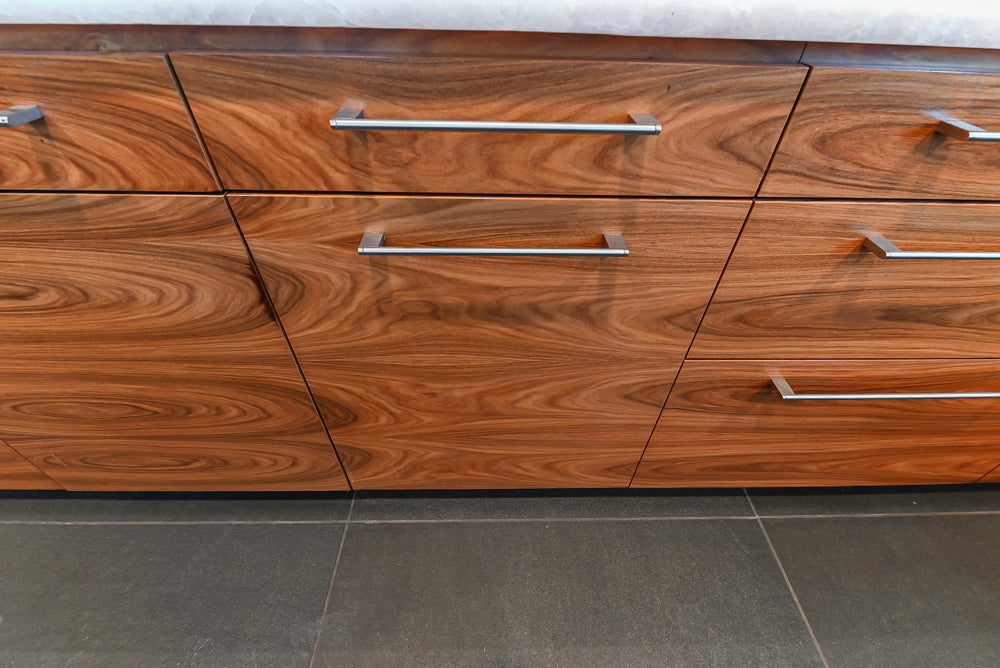 Custom Modern Tigerwood Kitchen with Marble Countertops and Gaggenau Appliances