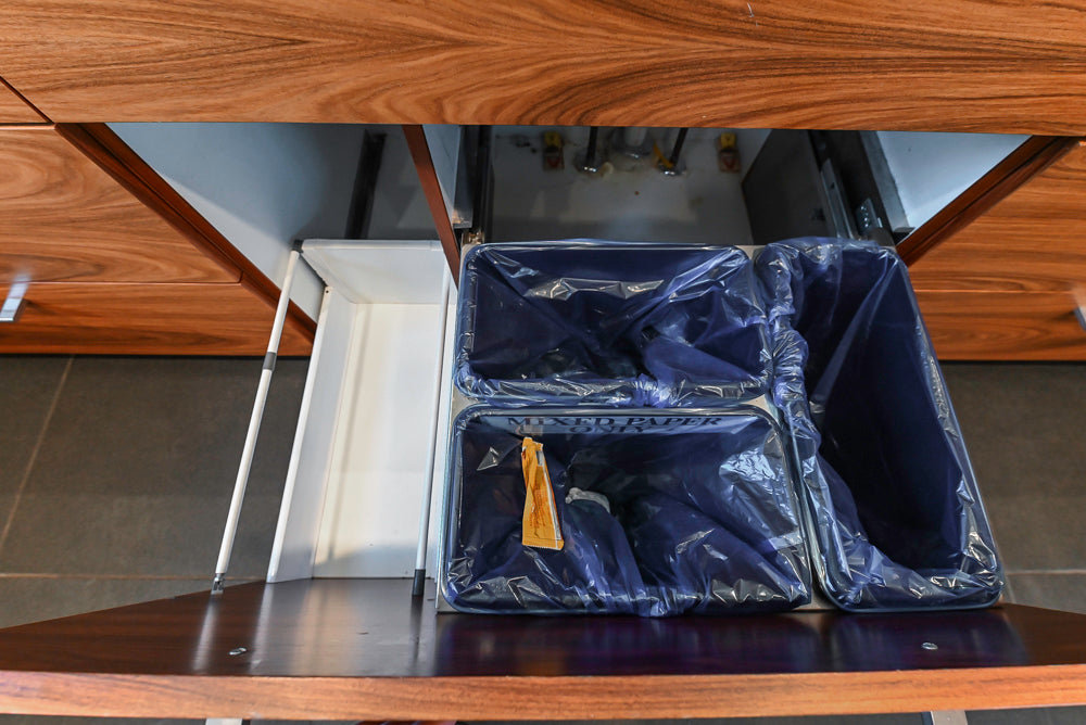 Custom Modern Tigerwood Kitchen with Marble Countertops and Gaggenau Appliances