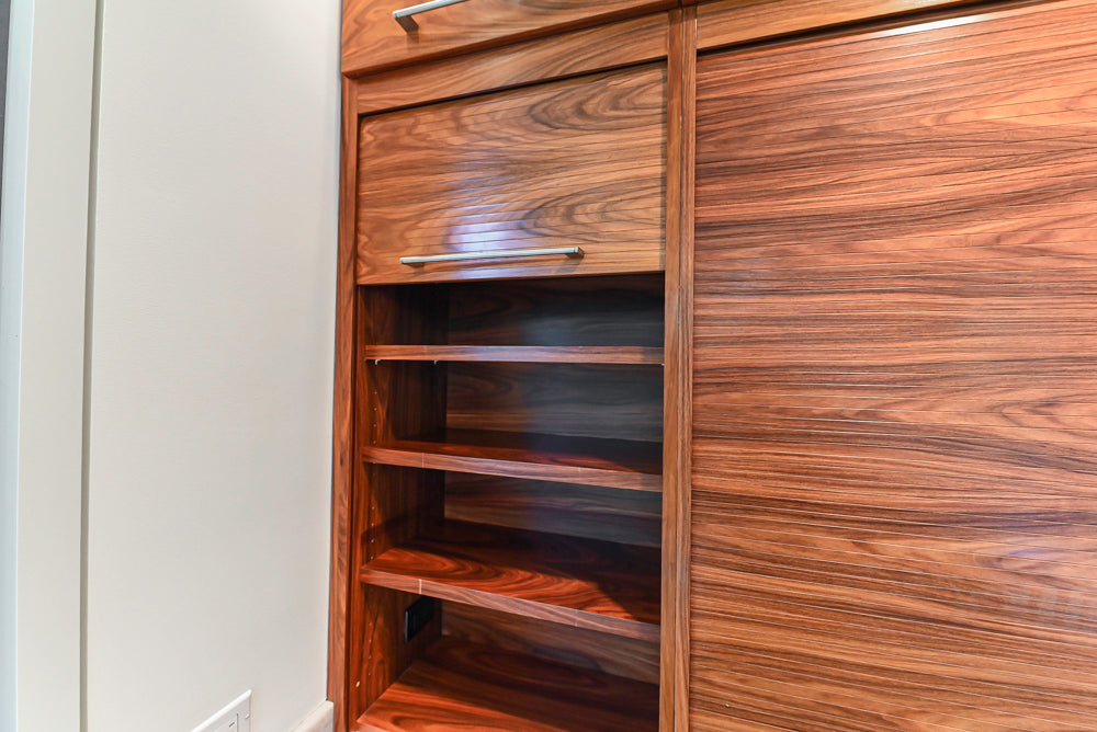 Custom Modern Tigerwood Kitchen with Marble Countertops and Gaggenau Appliances