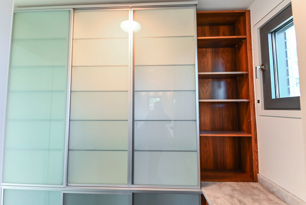 Custom Modern Tigerwood & Glass Paned Butler's Pantry with Marble Countertops