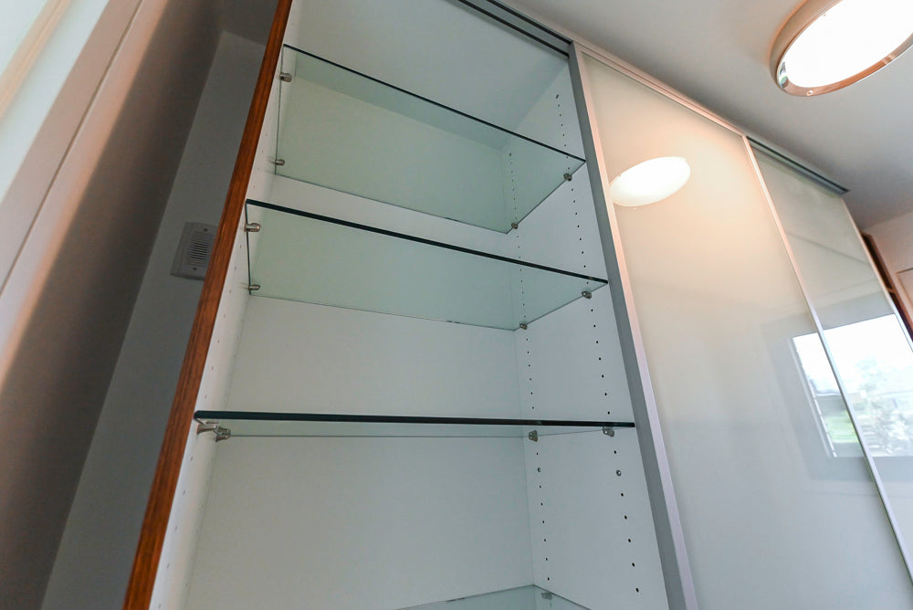 Custom Modern Tigerwood & Glass Paned Butler's Pantry with Marble Countertops