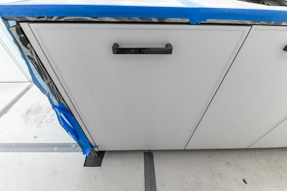 Custom Transitional White Kitchen with Island and Quartzite Countertops 