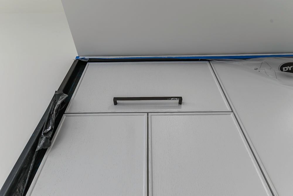 Smallbone Transitional White Kitchen with Island and Quartzite Countertops