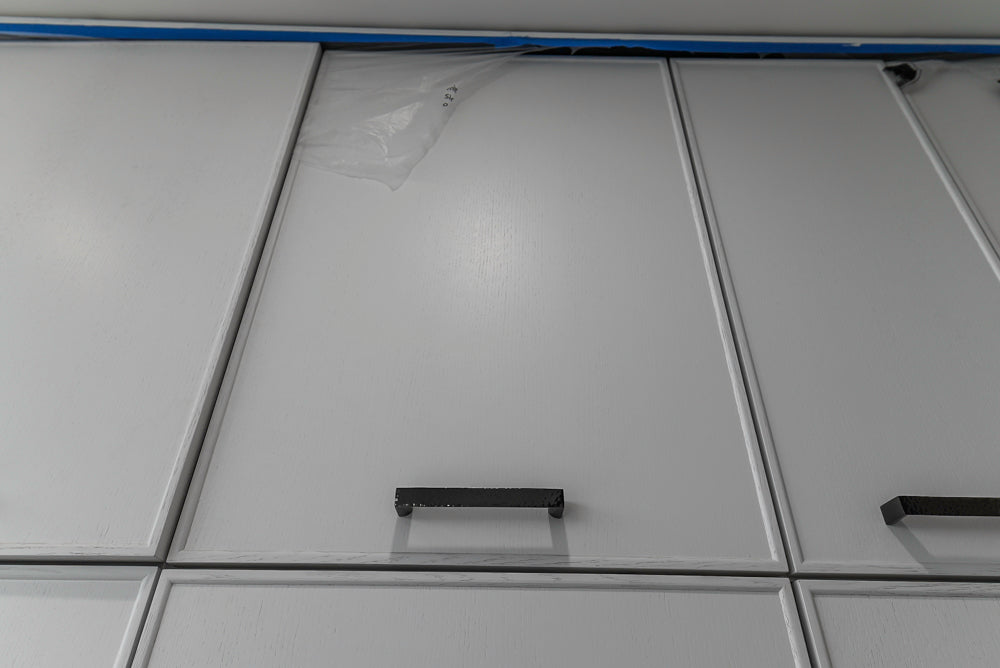 Smallbone Transitional White Kitchen with Island and Quartzite Countertops