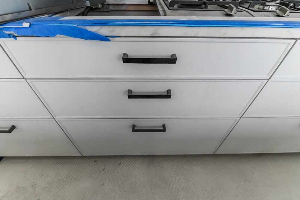 Smallbone Transitional White Kitchen with Island and Quartzite Countertops