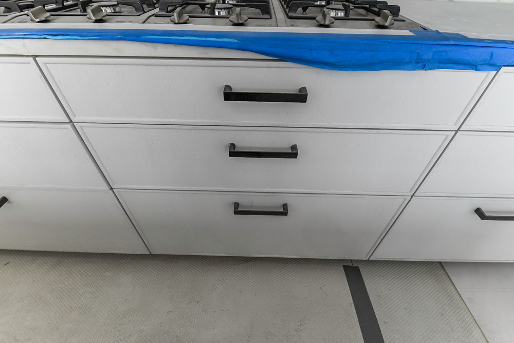 Smallbone Transitional White Kitchen with Island and Quartzite Countertops