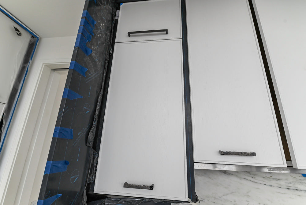 Smallbone Transitional White Kitchen with Island and Quartzite Countertops