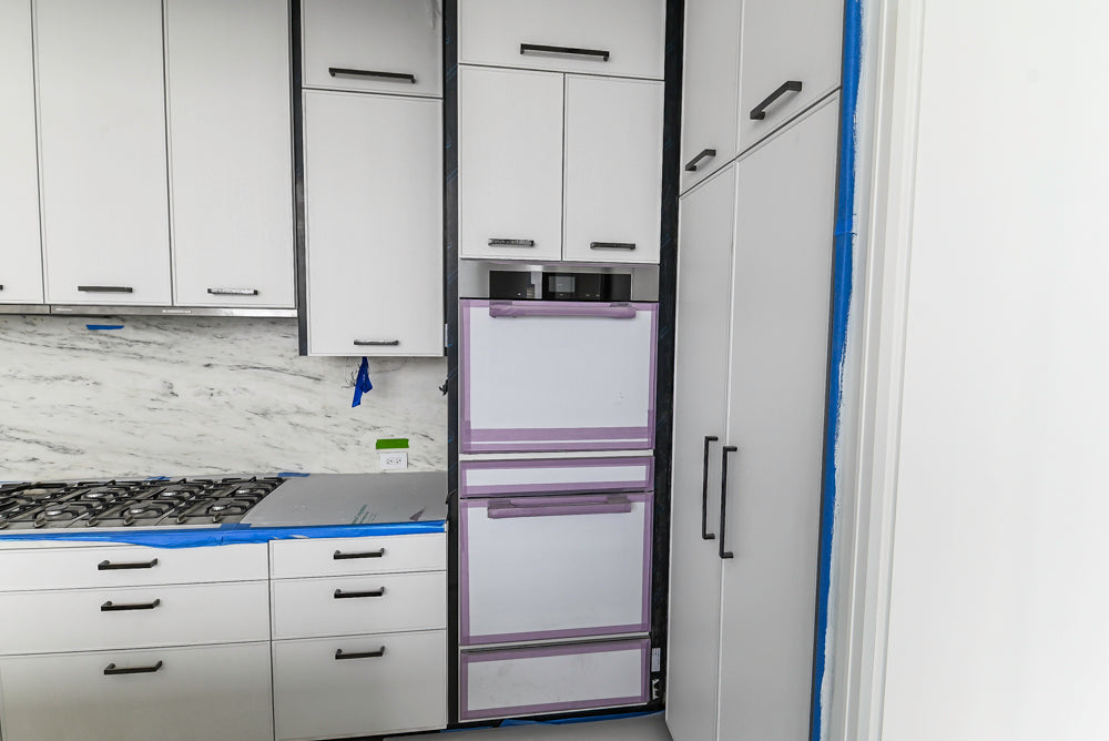Smallbone Transitional White Kitchen with Island and Quartzite Countertops