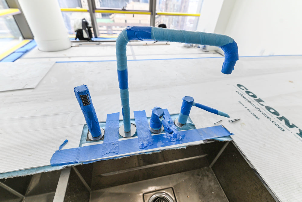 Smallbone Transitional White Kitchen with Island and Quartzite Countertops