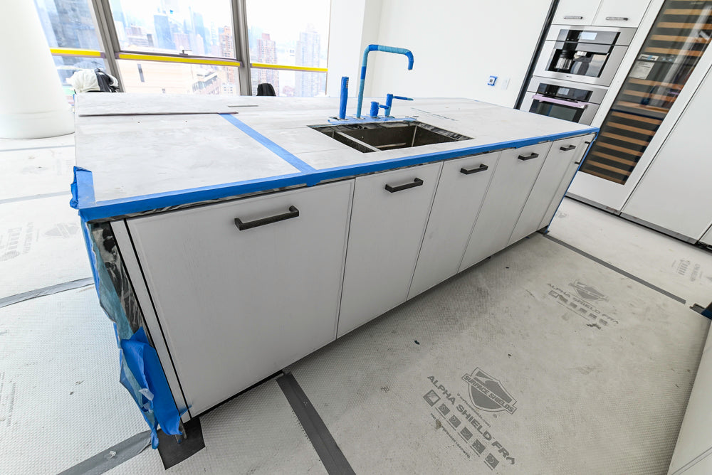 Custom Transitional White Kitchen with Island and Quartzite Countertops 