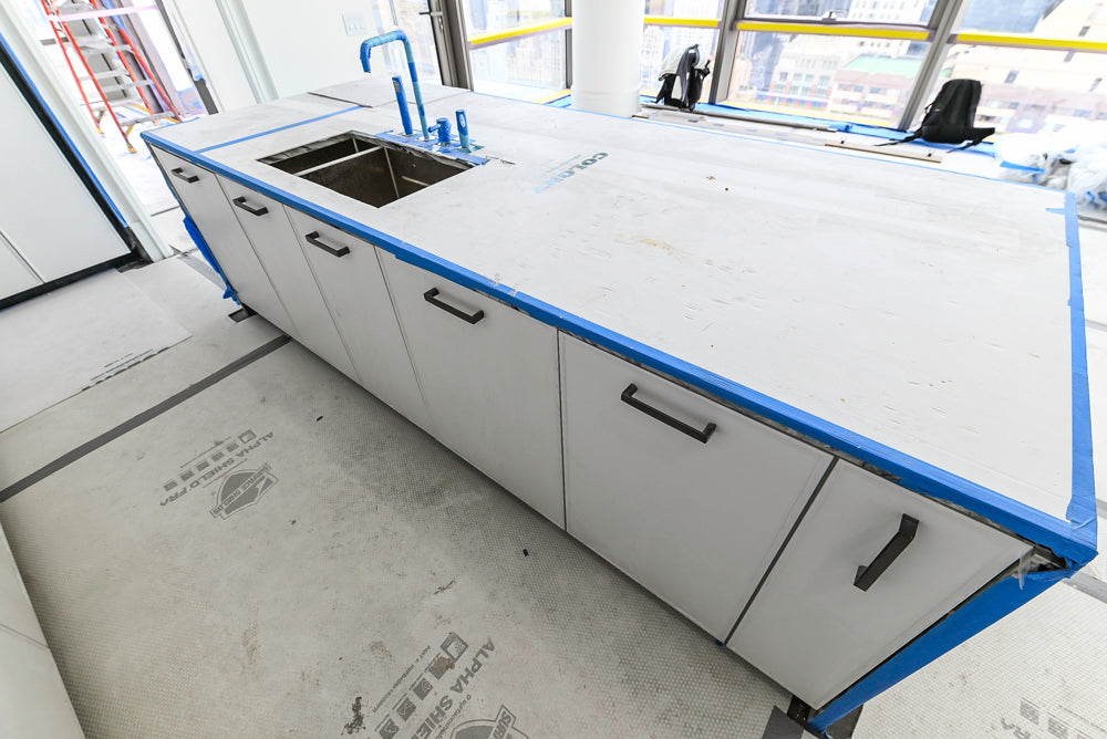 Custom Transitional White Kitchen with Island and Quartzite Countertops 