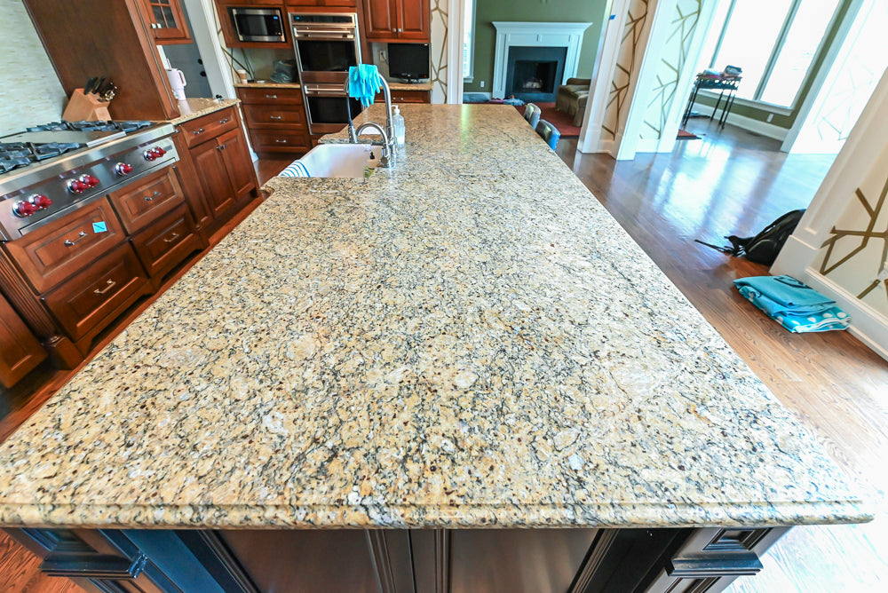 Century Traditional Cherry Kitchen with Granite Countertops and Sub-Zero and Wolf Appliances