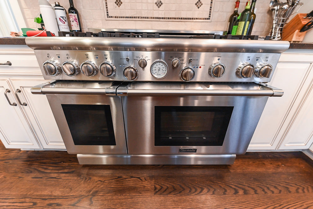 "The Whitby" Traditional Distressed White Kitchen with Island, Desk Area & Thermador Appliances