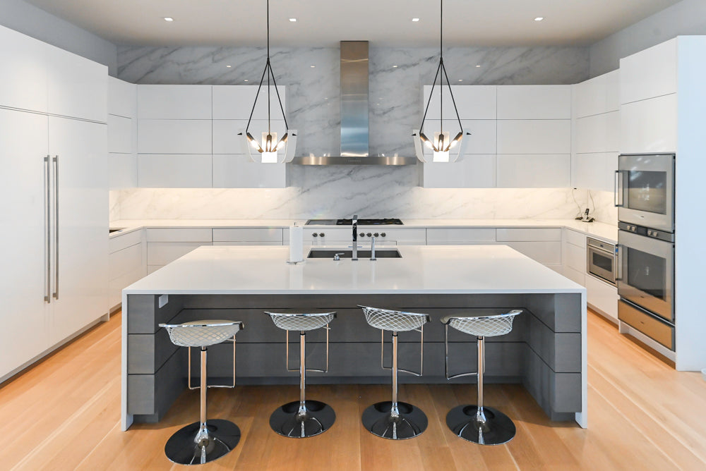 Brubaker Modern White Lacquered Kitchen with Waterfall Island and Stone Countertops