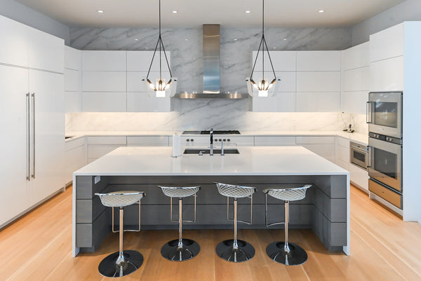 Brubaker Modern White Lacquered Kitchen with Waterfall Island and Stone Countertops