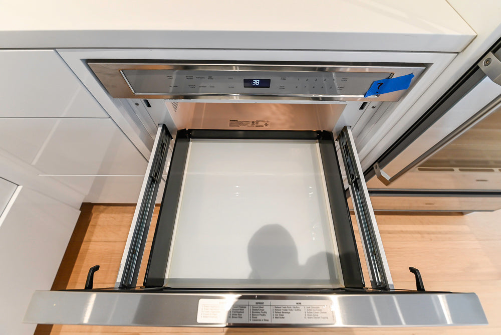 Brubaker Modern White Lacquered Kitchen with Waterfall Island and Stone Countertops