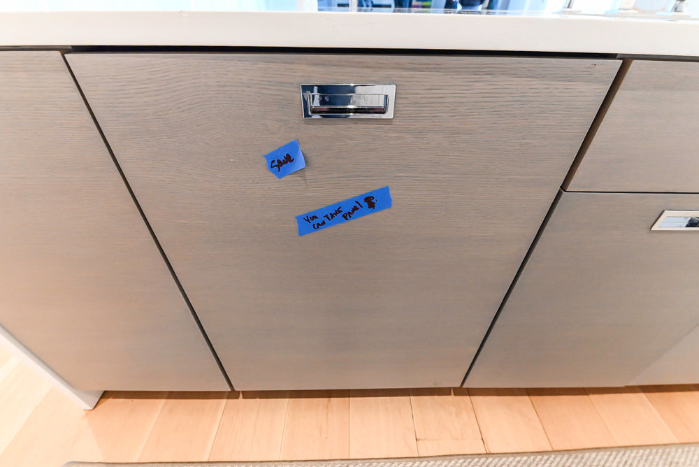 Brubaker Modern White Lacquered Kitchen with Waterfall Island and Stone Countertops