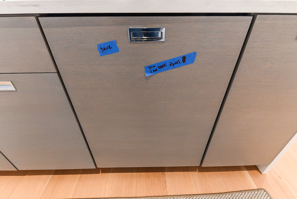 Brubaker Modern White Lacquered Kitchen with Waterfall Island and Stone Countertops