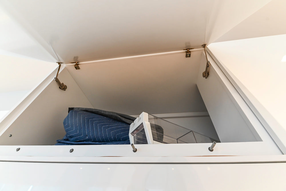 Brubaker Modern White Lacquered Kitchen with Waterfall Island and Stone Countertops