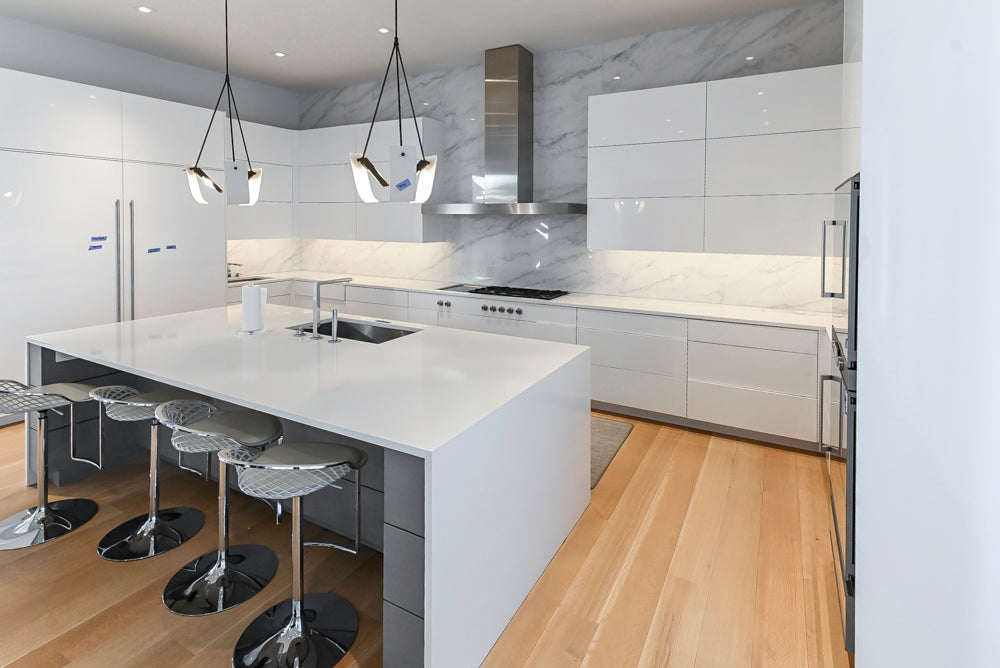 Brubaker Modern White Lacquered Kitchen with Waterfall Island and Stone Countertops