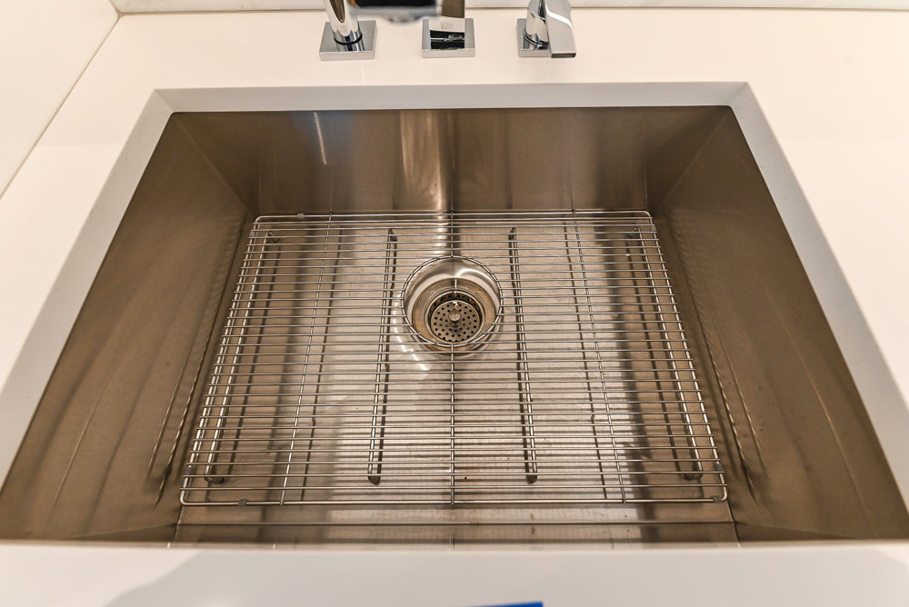 Brubaker Modern White Lacquered Kitchen with Waterfall Island and Stone Countertops