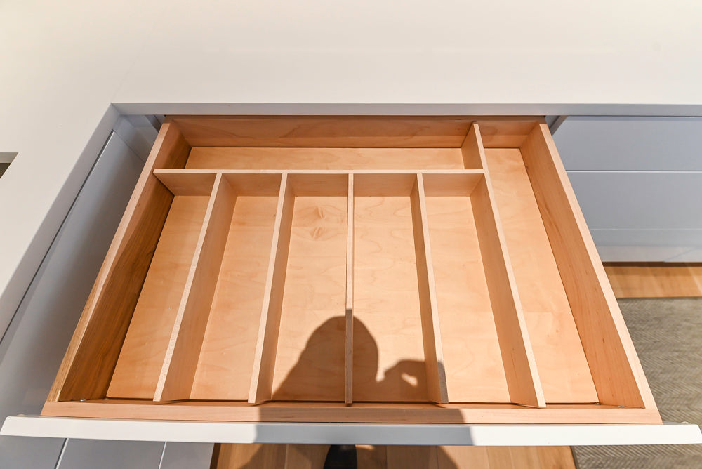 Brubaker Modern White Lacquered Kitchen with Waterfall Island and Stone Countertops