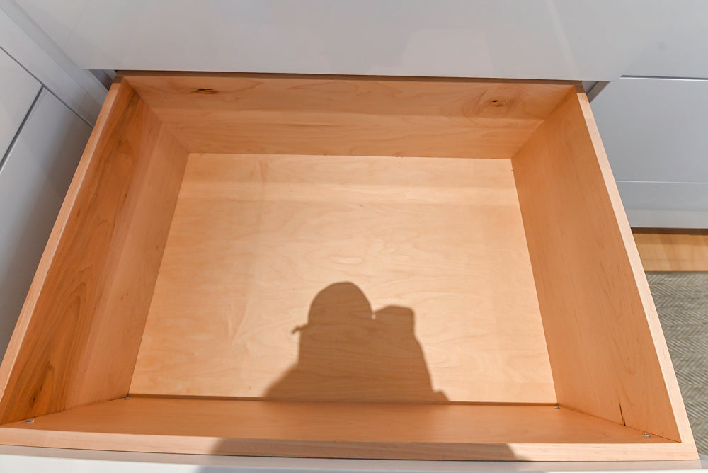 Brubaker Modern White Lacquered Kitchen with Waterfall Island and Stone Countertops