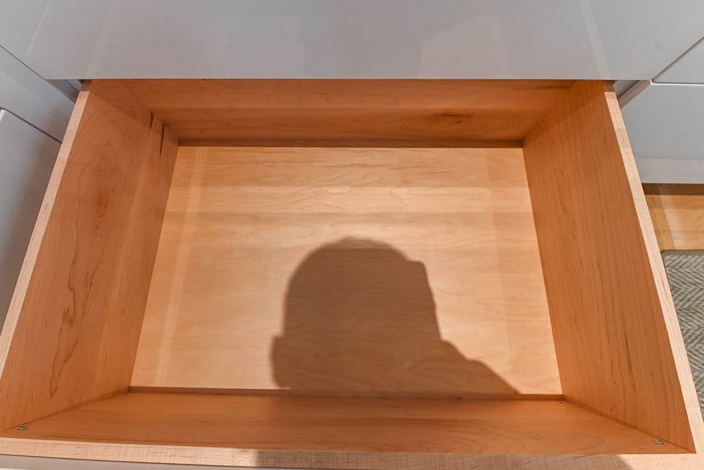 Brubaker Modern White Lacquered Kitchen with Waterfall Island and Stone Countertops