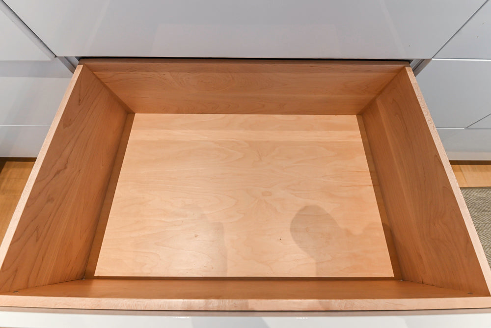 Brubaker Modern White Lacquered Kitchen with Waterfall Island and Stone Countertops