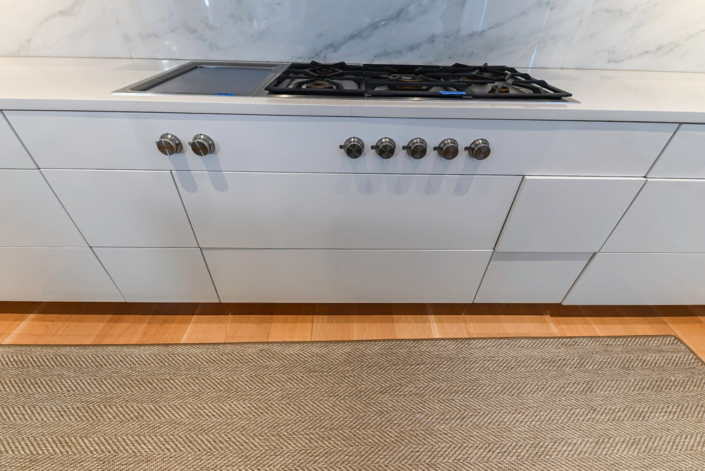 Brubaker Modern White Lacquered Kitchen with Waterfall Island and Stone Countertops