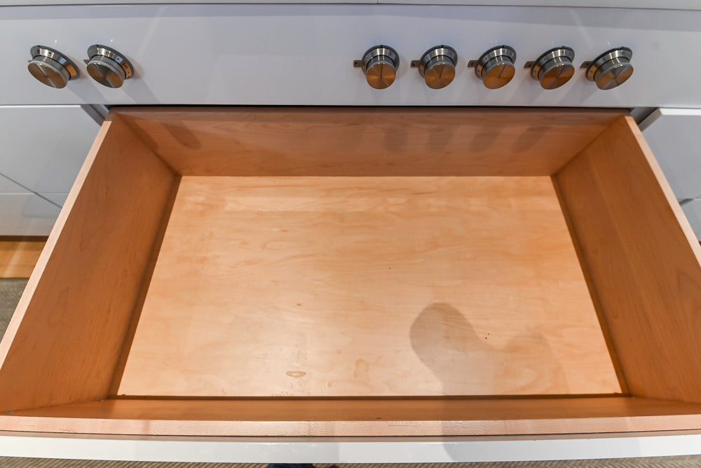 Brubaker Modern White Lacquered Kitchen with Waterfall Island and Stone Countertops