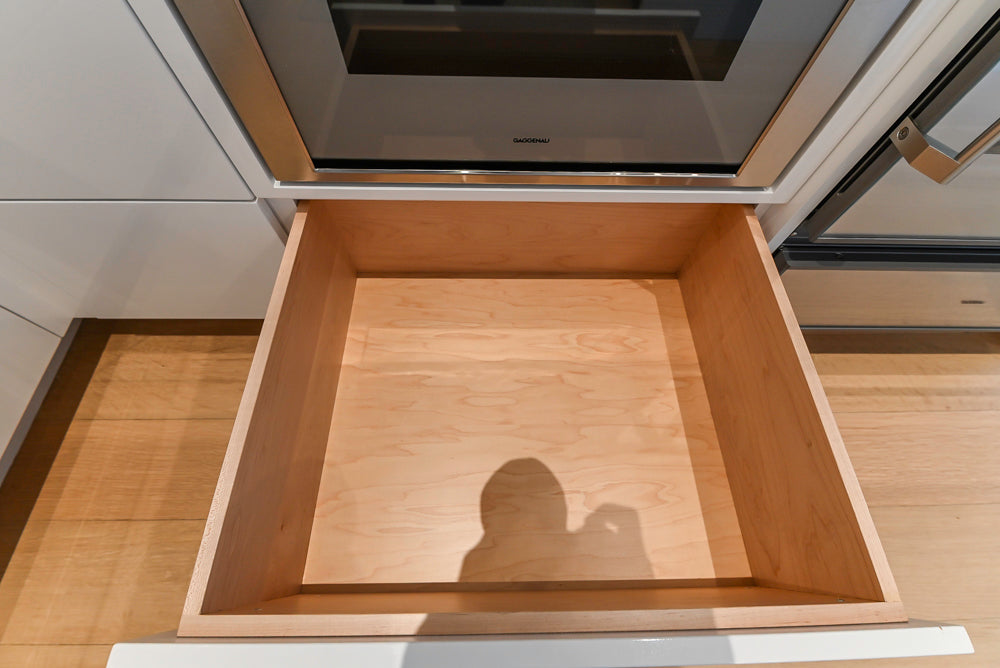 Brubaker Modern White Lacquered Kitchen with Waterfall Island and Stone Countertops