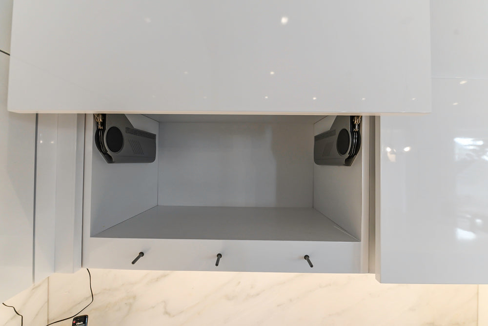 Brubaker Modern White Lacquered Kitchen with Waterfall Island and Stone Countertops