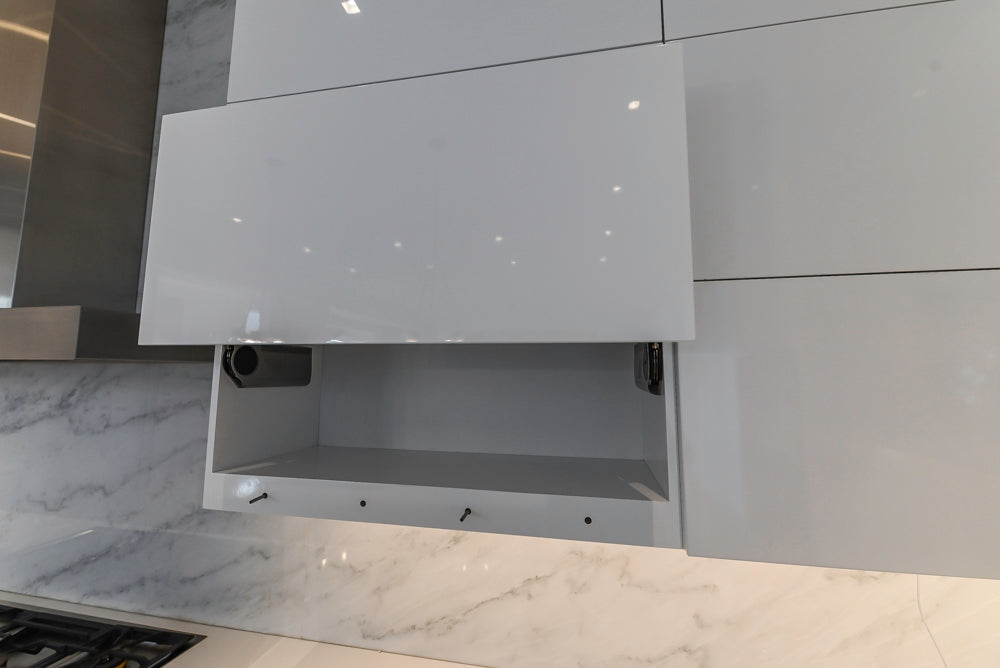 Brubaker Modern White Lacquered Kitchen with Waterfall Island and Stone Countertops