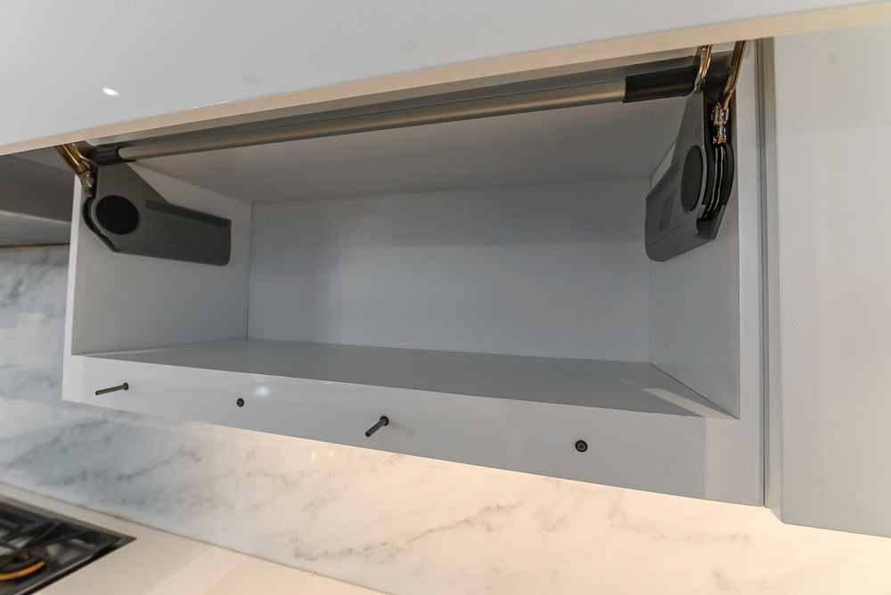 Brubaker Modern White Lacquered Kitchen with Waterfall Island and Stone Countertops