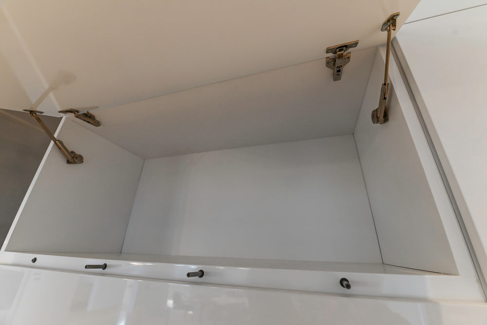 Brubaker Modern White Lacquered Kitchen with Waterfall Island and Stone Countertops