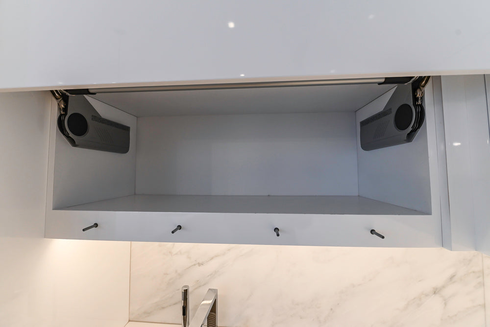 Brubaker Modern White Lacquered Kitchen with Waterfall Island and Stone Countertops