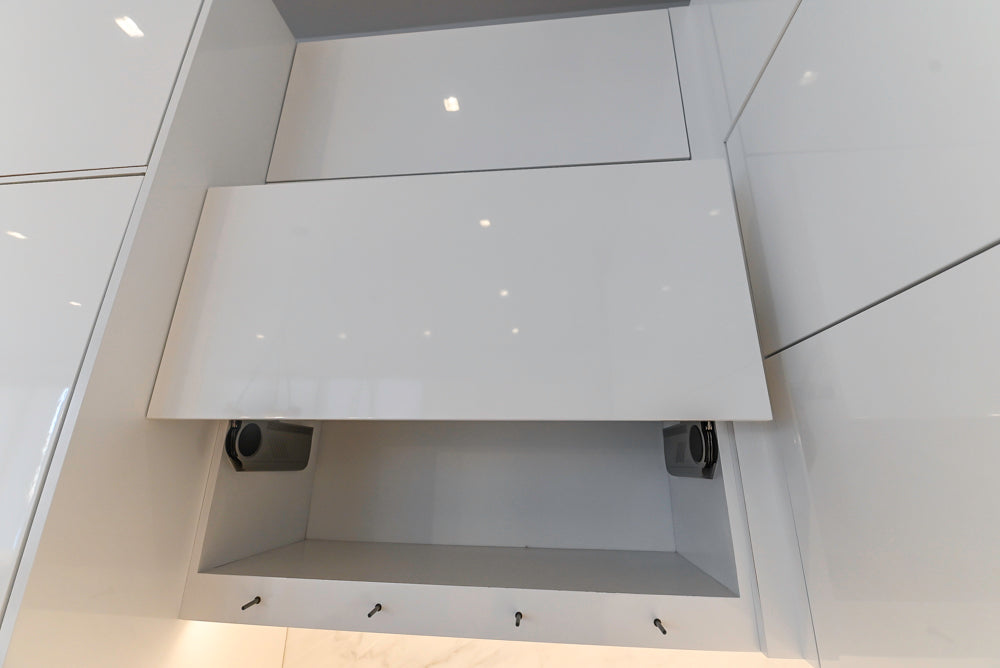 Brubaker Modern White Lacquered Kitchen with Waterfall Island and Stone Countertops