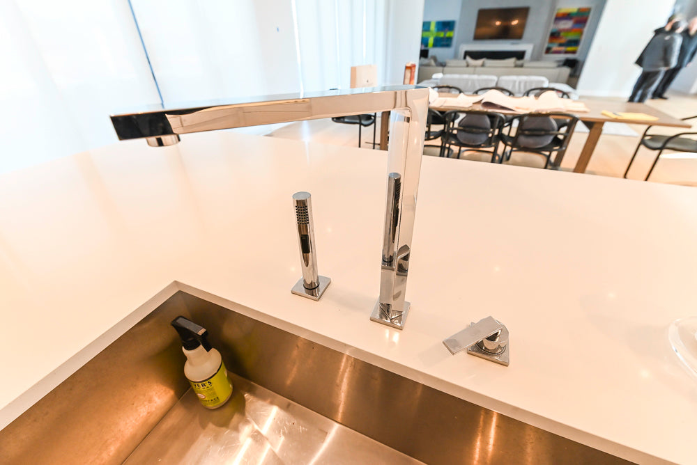 Brubaker Modern White Lacquered Kitchen with Waterfall Island and Stone Countertops