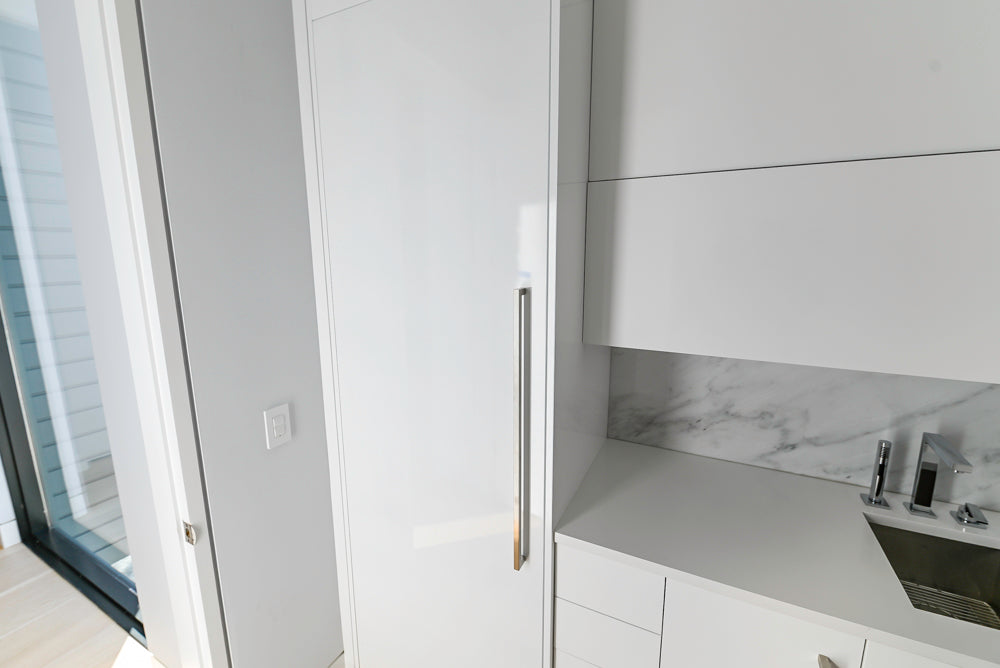 Brubaker Modern White Lacquered Butler's Pantry with Stone Countertops and Ice Maker